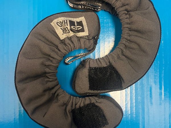 A pair of soft fabric blade soakers on a blue background