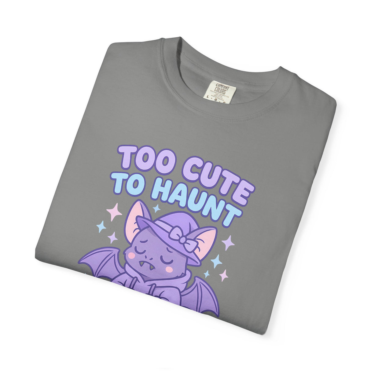 Gray t-shirt with purple bat graphic and 'Too Cute To Haunt' text on a white background