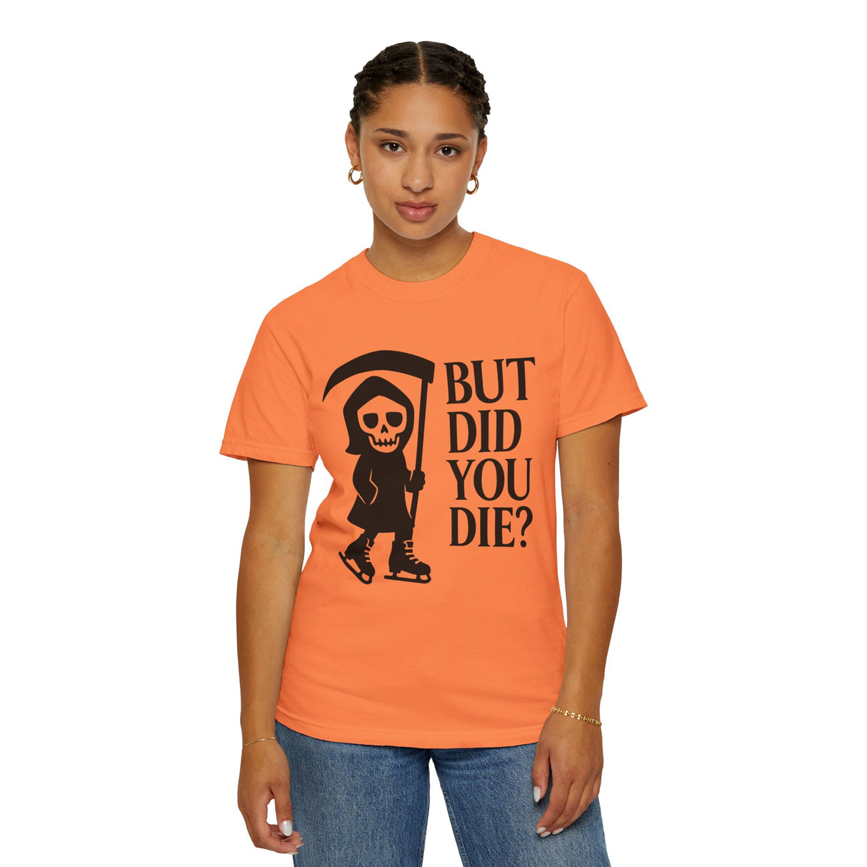 Person wearing an orange t-shirt with a graphic and text on a white background