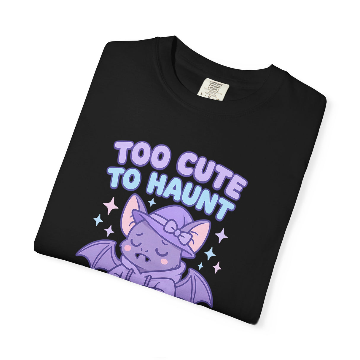 Black t-shirt with a purple bat graphic and 'Too Cute To Haunt' text on a white background