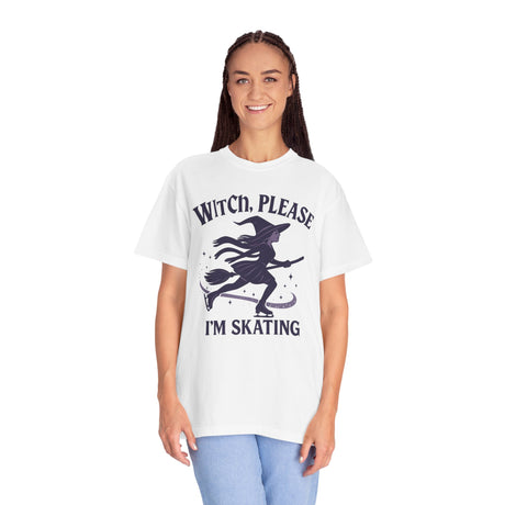 Person wearing a white t-shirt with a witch graphic and text on a white background