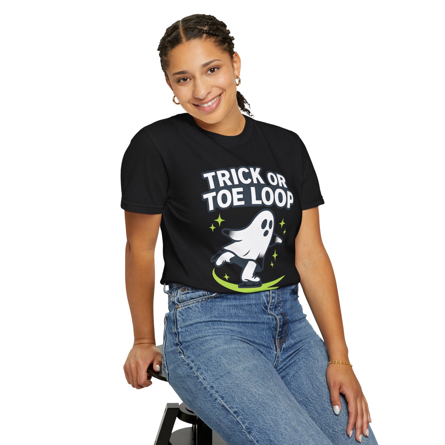 Person wearing a black t-shirt with 'Trick or Toe Loop' text and ghost graphic on a white background