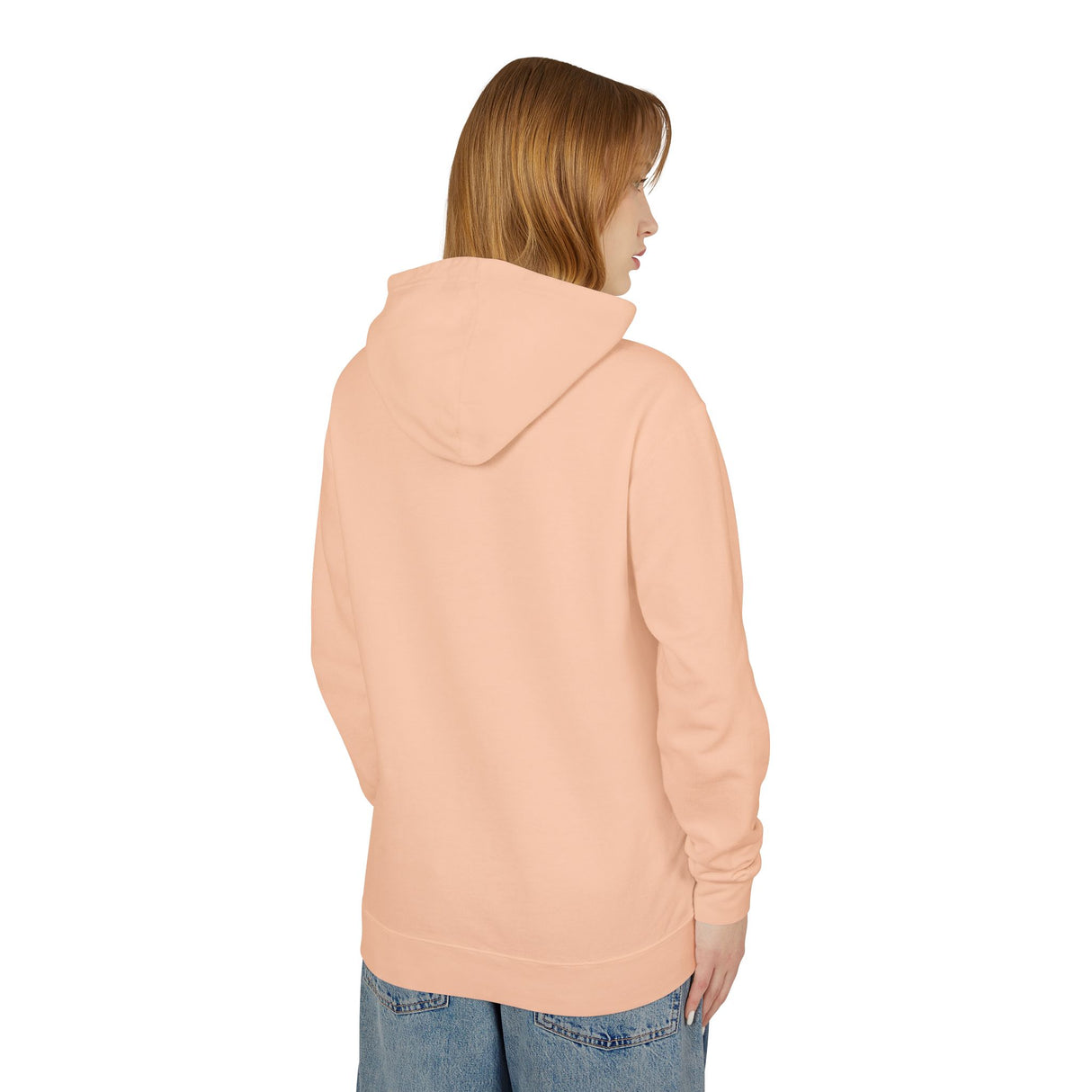 Person wearing a peach hoodie on a white background