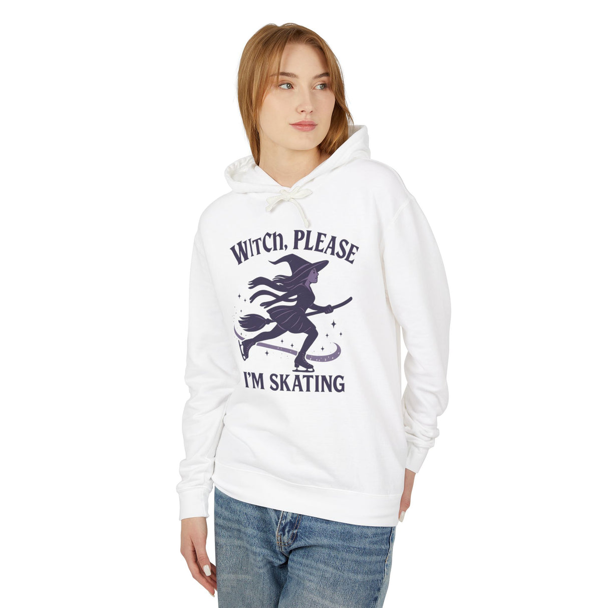 Woman wearing a white hoodie with a witch graphic and text on a white background