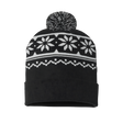 Black beanie with white snowflake pattern and pom-pom on a white background