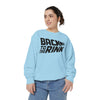 Person wearing a light blue sweatshirt with 'Back to the Rink' text on a white background