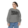 Person wearing a gray sweatshirt with 'Back to the Rink' text on a white background
