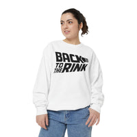Woman wearing a white sweatshirt with 'Back to the Rink' text on a white background