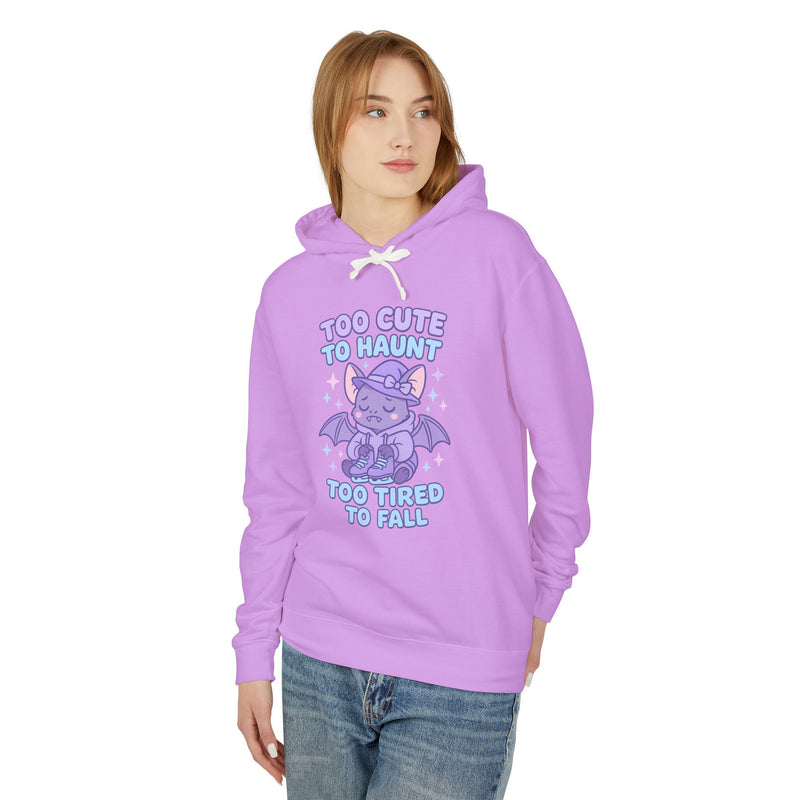 Person wearing a purple hoodie with a graphic and text on a white background