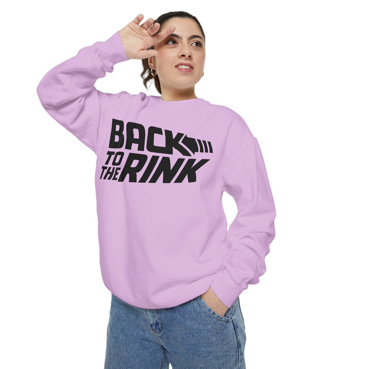 Person wearing a light purple sweatshirt with 'Back to the Rink' text on a white background