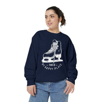 Person wearing a navy blue sweatshirt with ice skate design and text on a white background