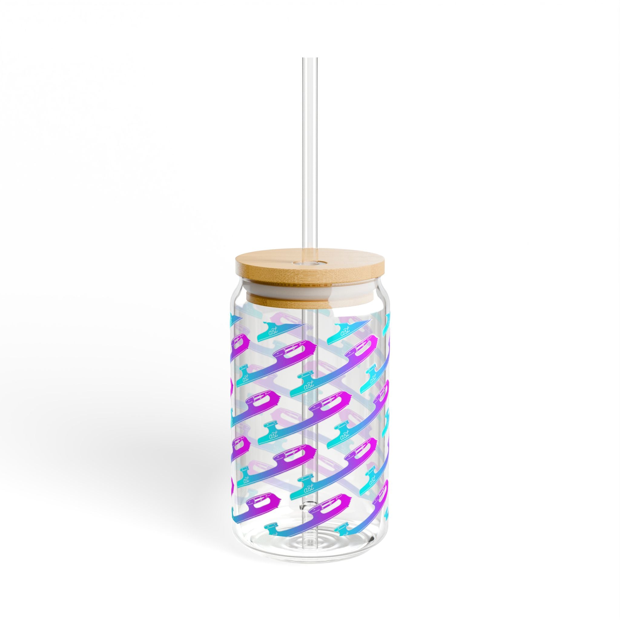 Clear tumbler with colorful pattern, wooden lid, and straw on a white background