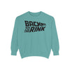 Teal sweatshirt with 'Back to the Rink' text on a white background