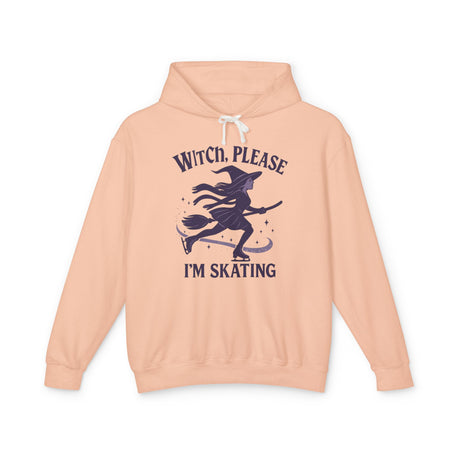 Peach hoodie with a witch graphic and text on a white background