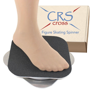 A bare foot on the CRS Cross figure skating spinner in front of its box