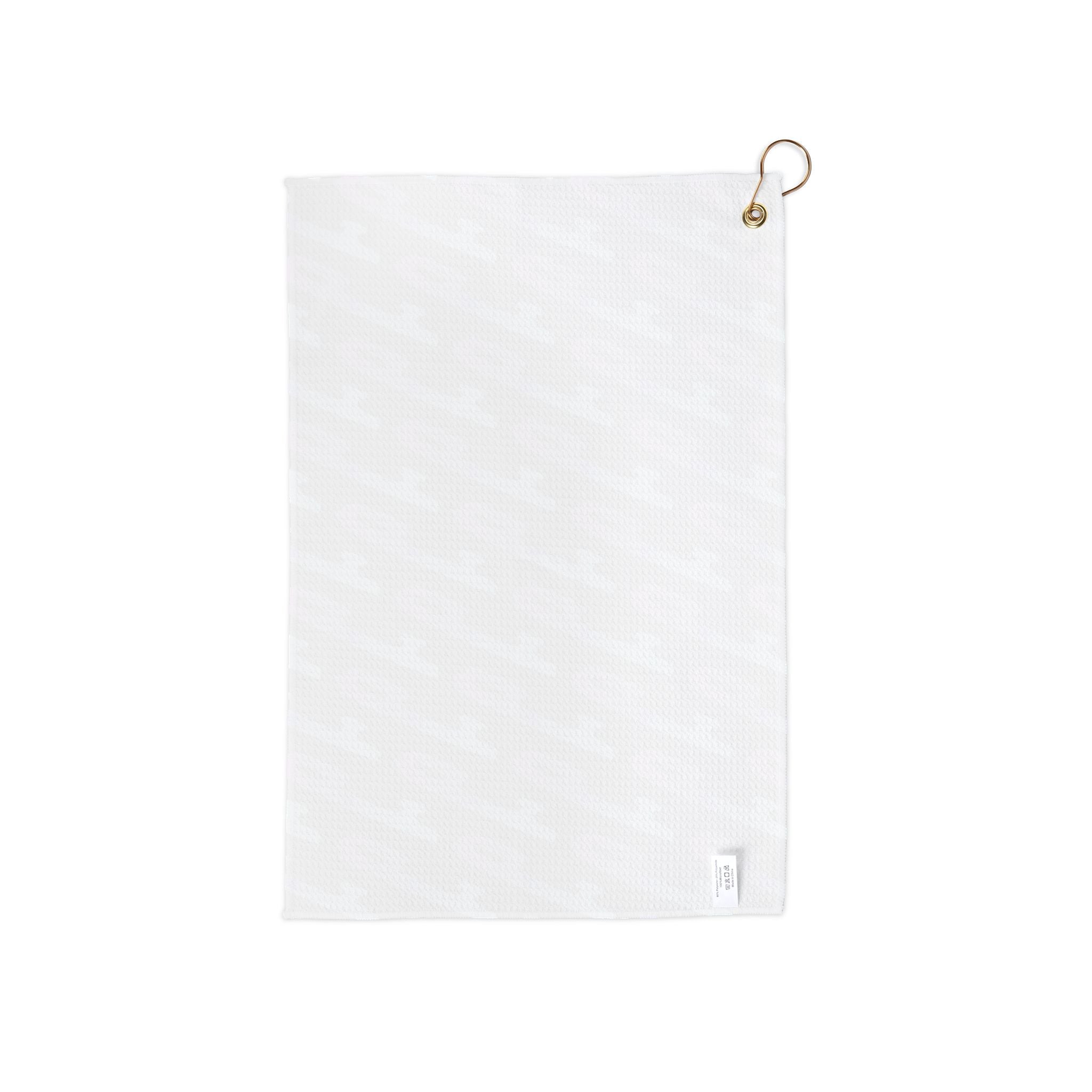 White towel with a gold hook on a white background