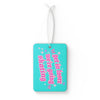 Turquoise tag with pink text and white background