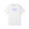 White t-shirt with blue and green text on a white background