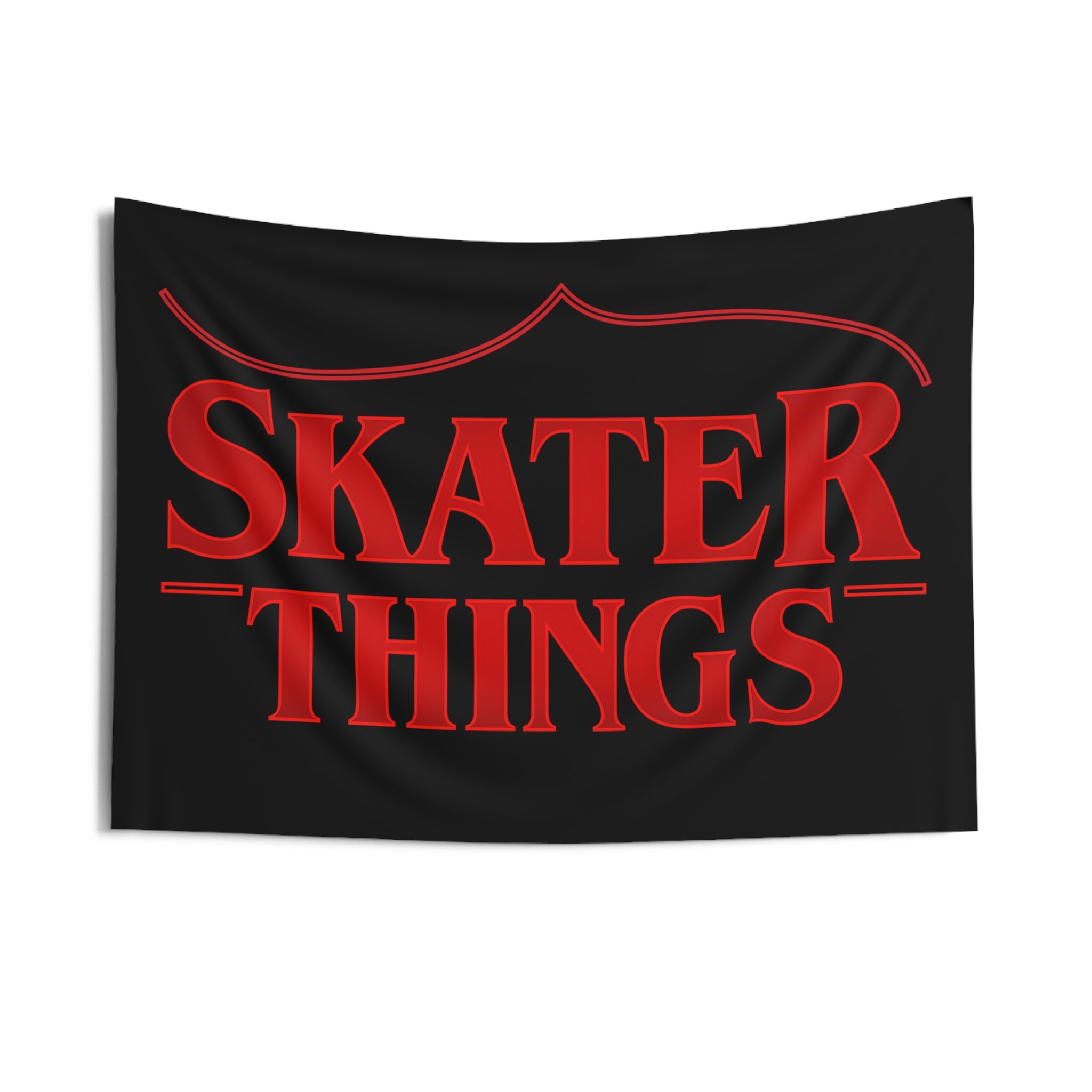 Black tapestry with red 'Skater Things' text on a white background