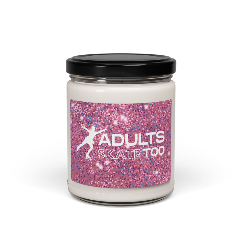 Jar with a pink glittery label and black lid on a white background