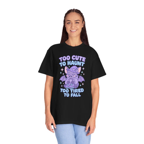 Person wearing a black t-shirt with a purple graphic and text on a white background