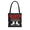 Black tote bag with red and white text and ice skates on a white background