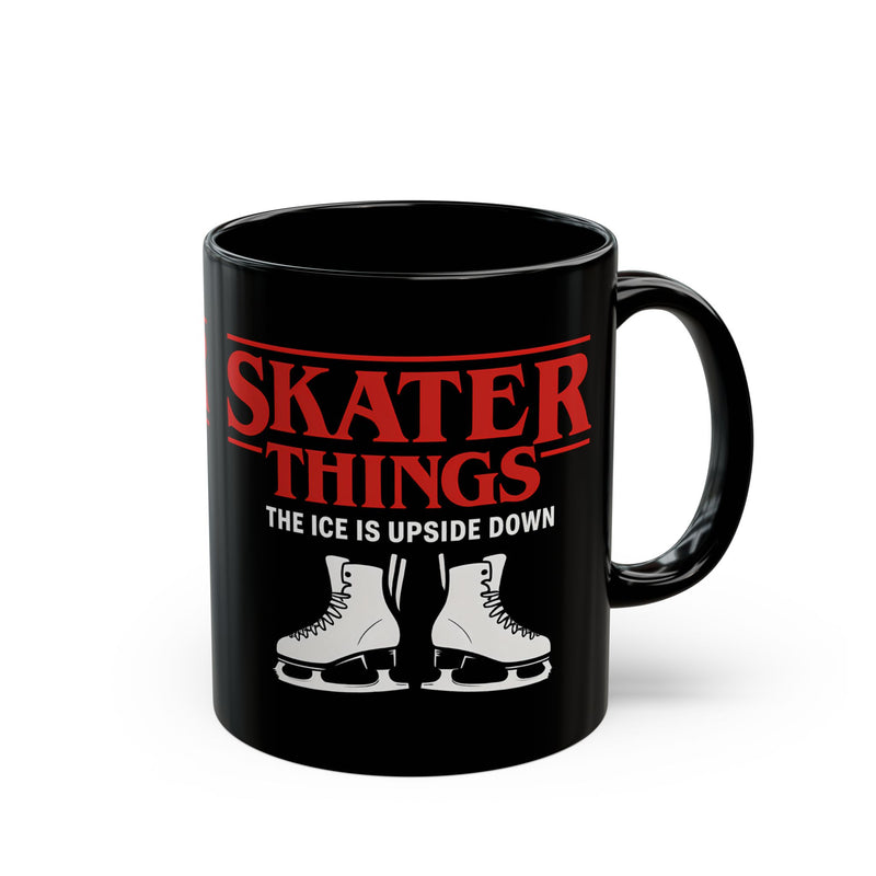 Black mug with red and white text and graphics on a white background