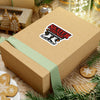Wooden gift box with a 'Stranger Things' sticker on a festive background with cookies and decorations.