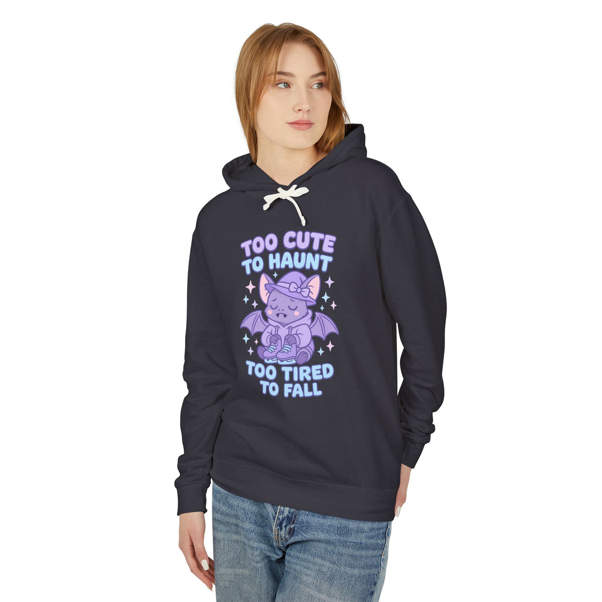 Person wearing a navy hoodie with a purple graphic and text on a white background