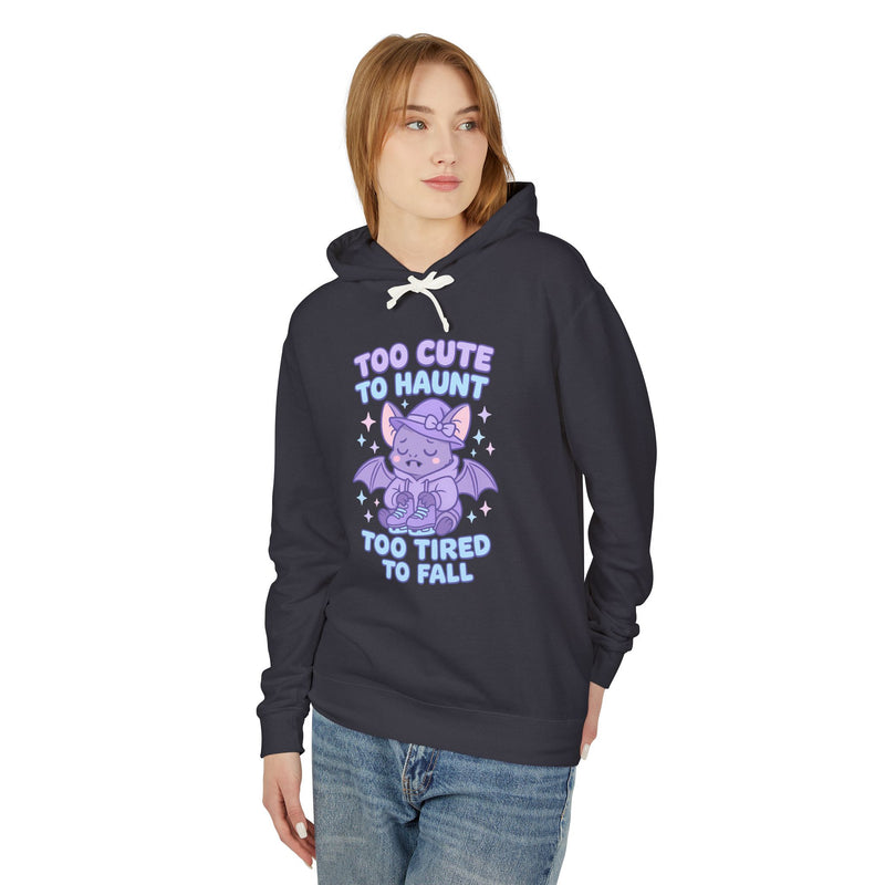 Person wearing a navy hoodie with a purple graphic and text on a white background