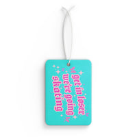 Turquoise luggage tag with pink text on a white background