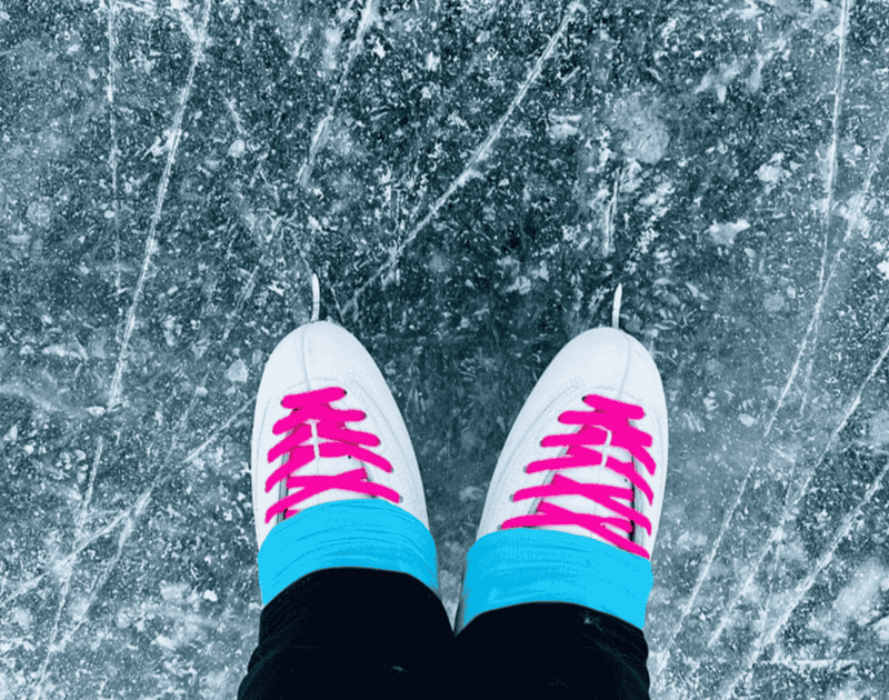 image of ice skates with pink laces