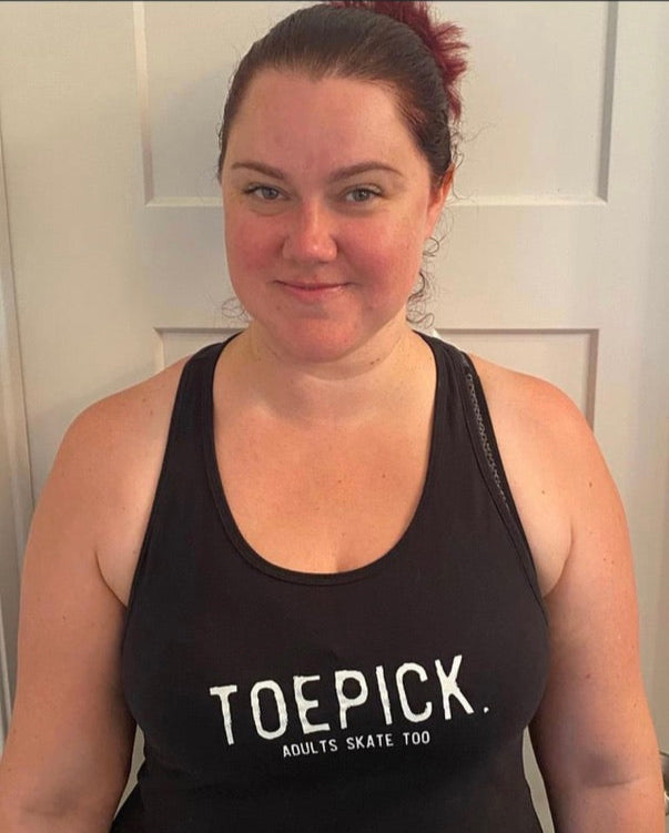 Cristian in a black tank top with the Toepick design