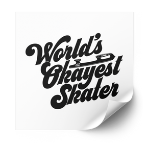 World's Okayest Skater heat transfer in black retro script with a skate blade, on a white backing sheet