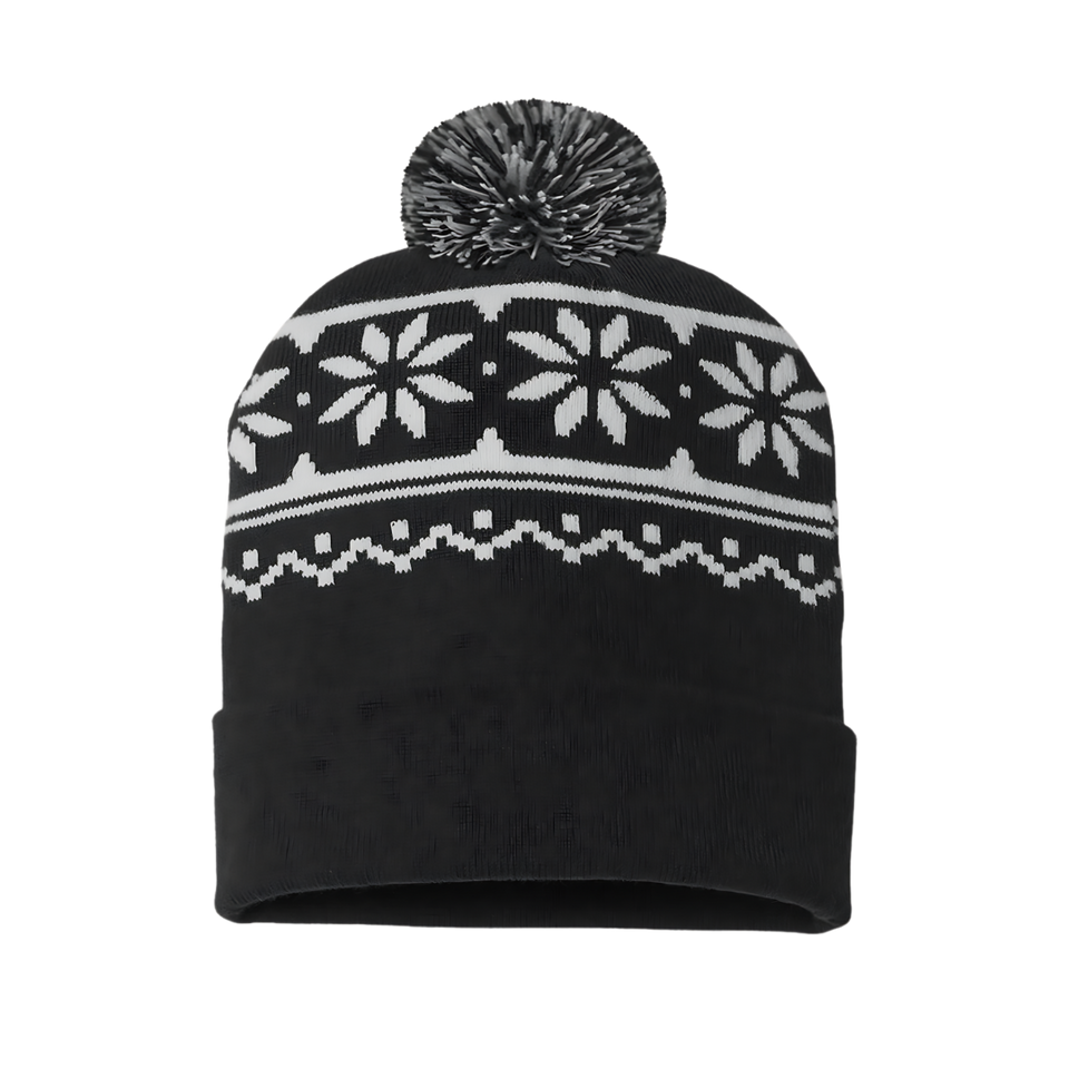 Black and white knit beanie with a snowflake pattern and a black and white pom