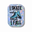 Holographic sticker with ice skates and text 'I Skate and I Fall' on a black background